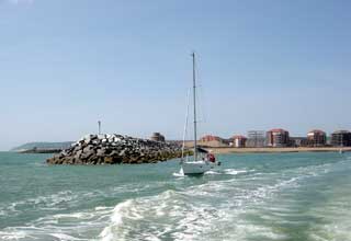 Sovereign harbour entrance is marked by stone piers