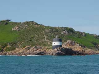 The Western Approach passes within a cable of Noirmont Point
