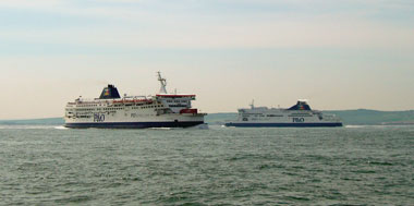 Ferries cross astern outside Calais
