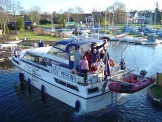 Our guests enjoy a Christmas morning cruise on the R. Bure