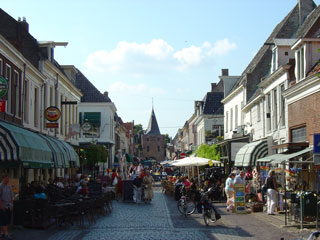 Elburg's busy high street guarded by the Vischpoort