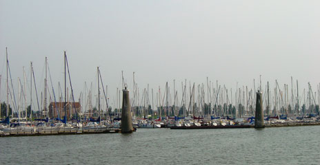 A forest of masts at Lelystad Haven - reporting pontoon to port on entry between the two pillars