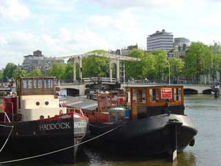 Houseboats line the Amstel near the Magere Brug