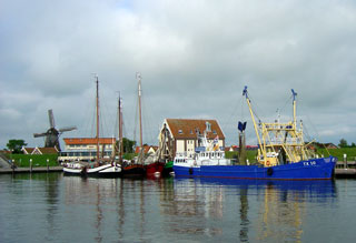 Fishing boats old and new in Oudeschild's working harbour