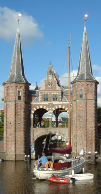 A yacht waits for the bridge in front of Sneek's 17th century Waterpoort