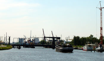 Following a convenient barge through Emden harbour