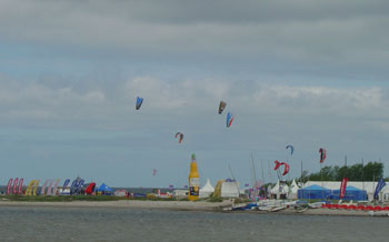 Kite surfing championshiops enjoy a blustery day