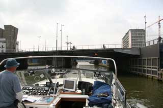 Approaching Oosterdok, the problem low bridge is visible in the background