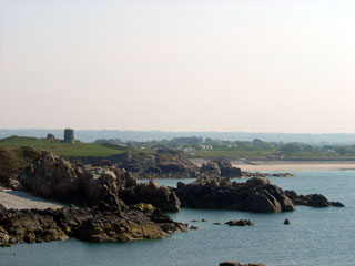 The rocky north coast shelters l'Ancresse Bay